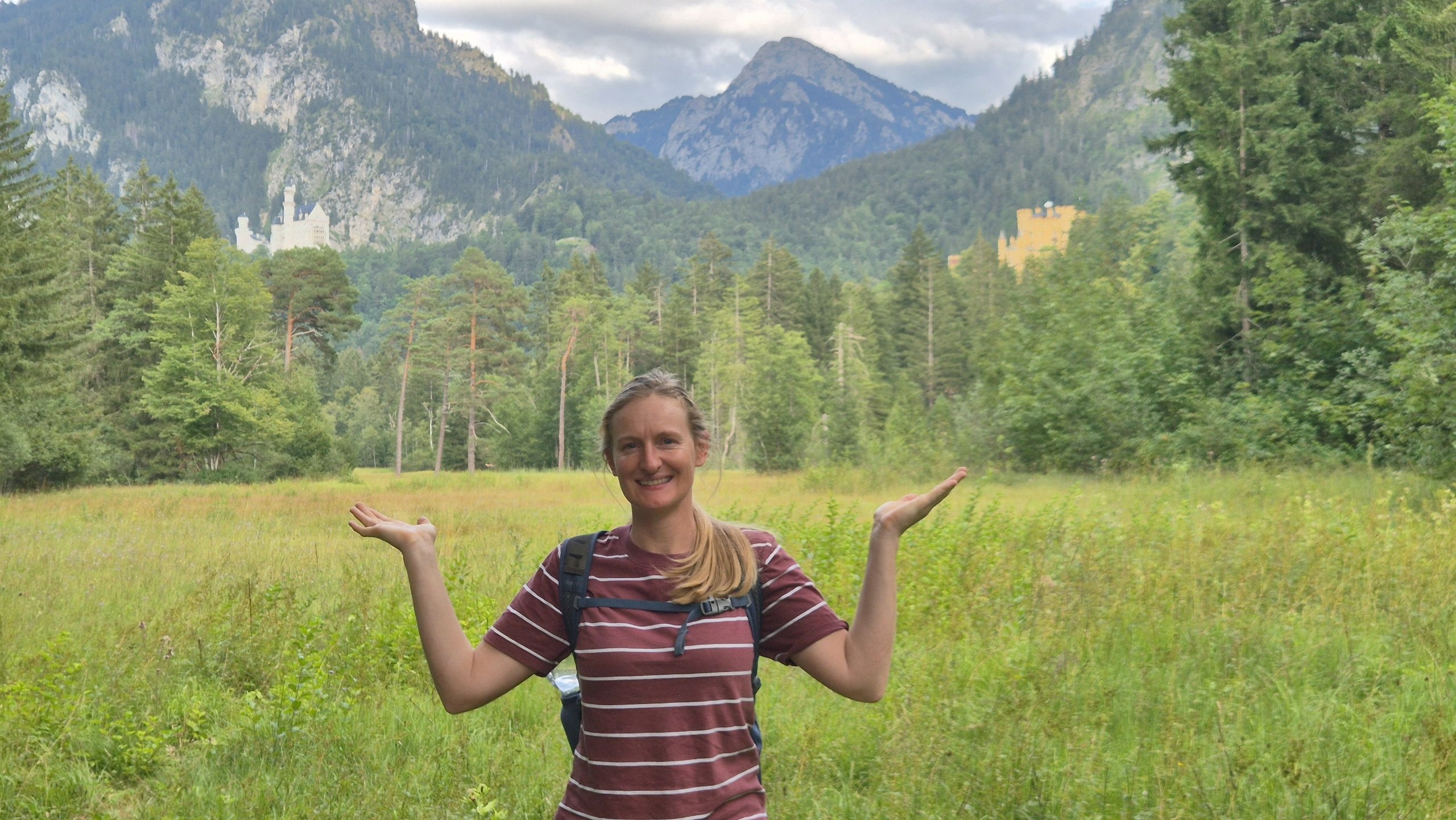 Caro with Neuschwanstein and Hohenschwangau in the distance