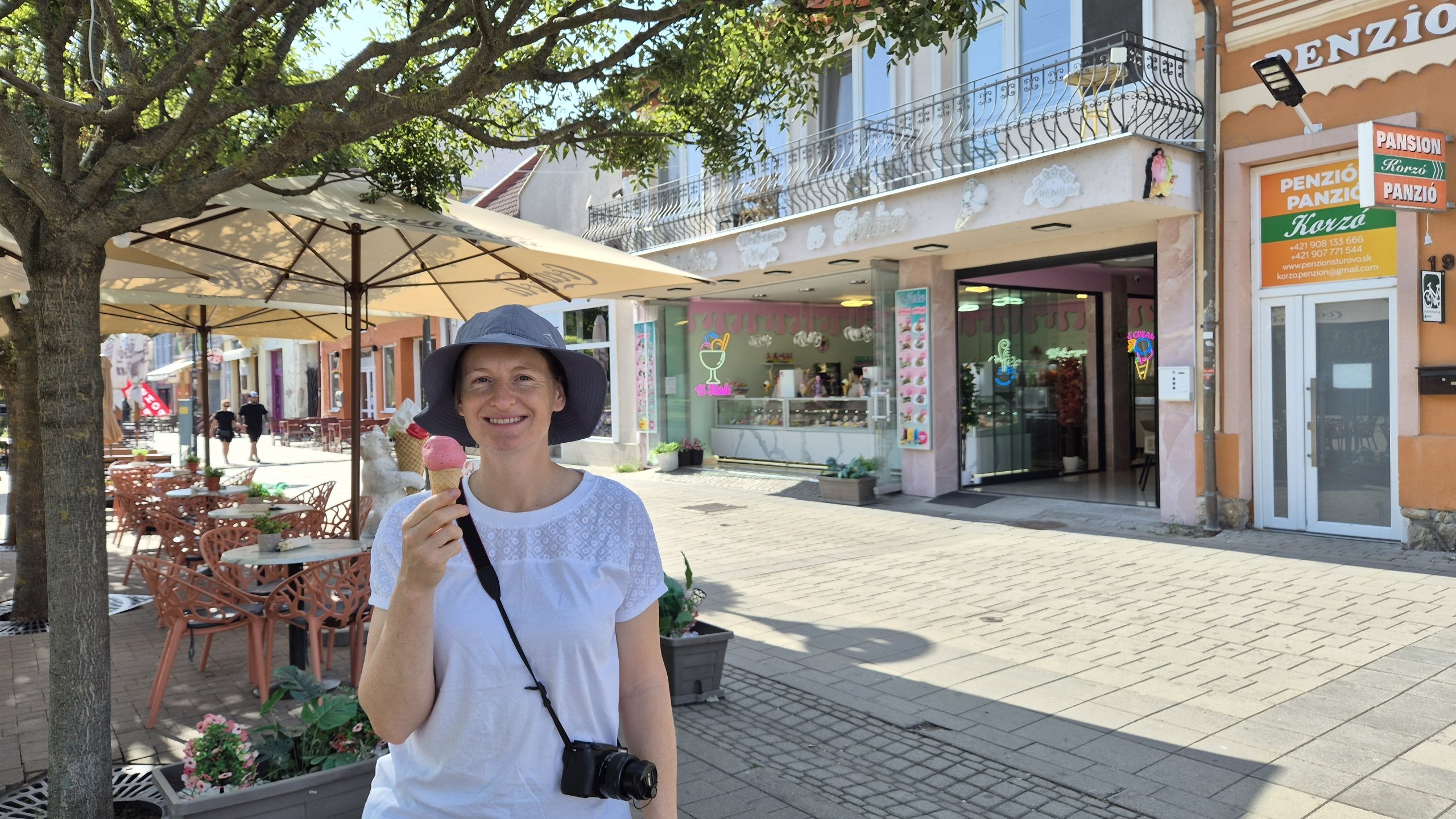 Caro eating soft-serve ice cream in Štúrovo, Slovakia