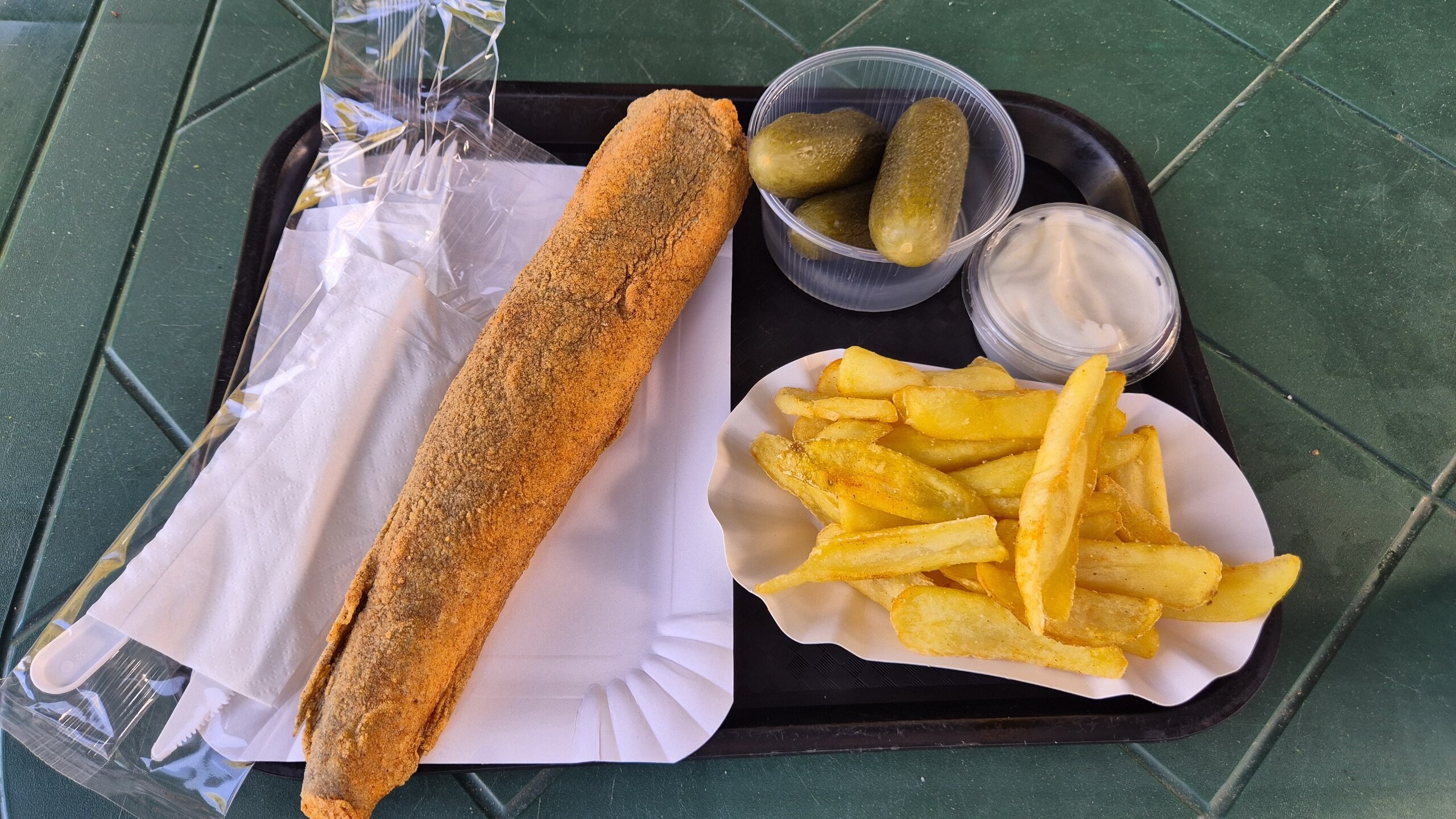 Crumbed fish with chips, gherkins and mayonnaise in Nagymaros