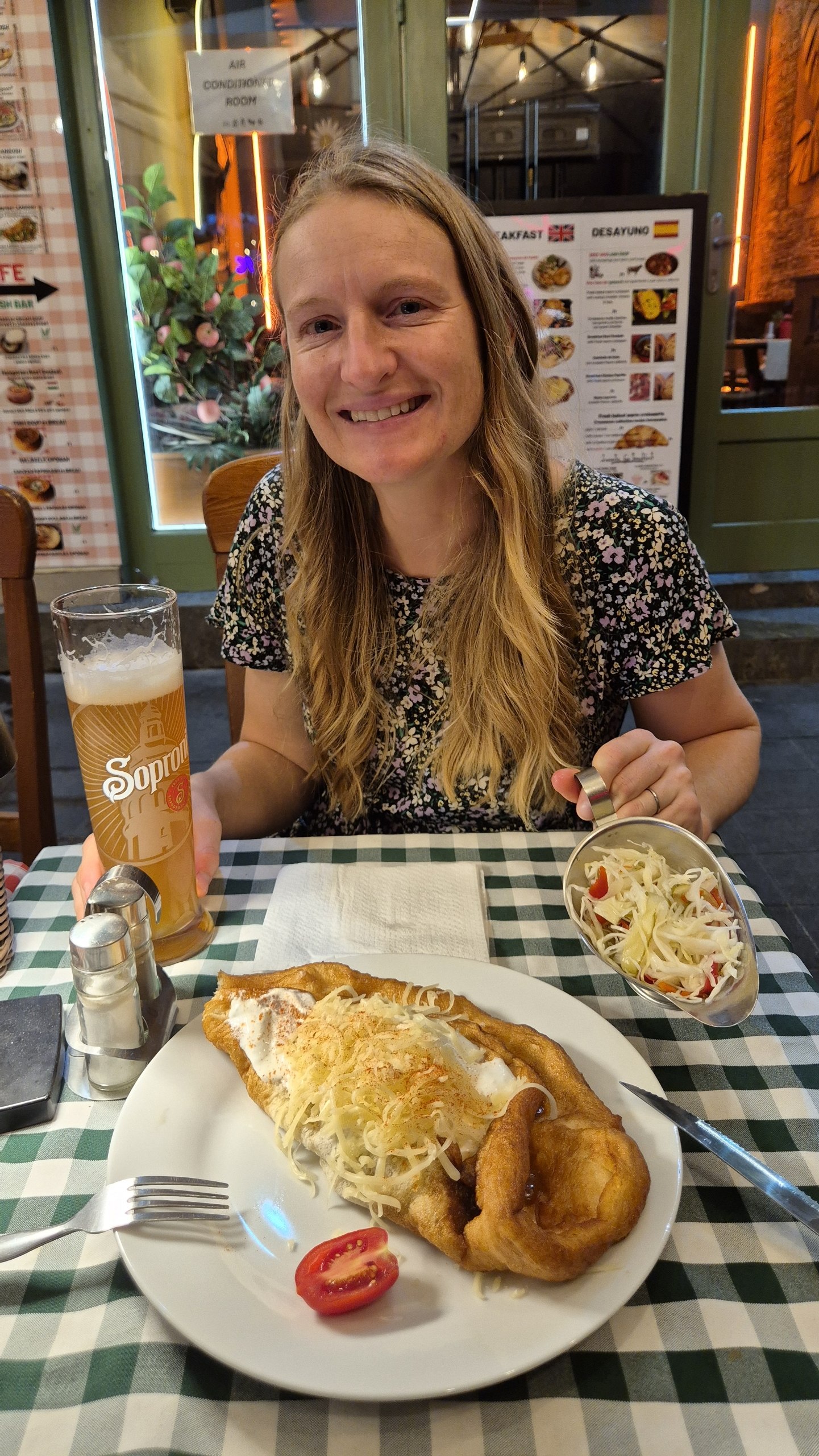 Caro with langos topped with beef stew in the Jewish Quarter