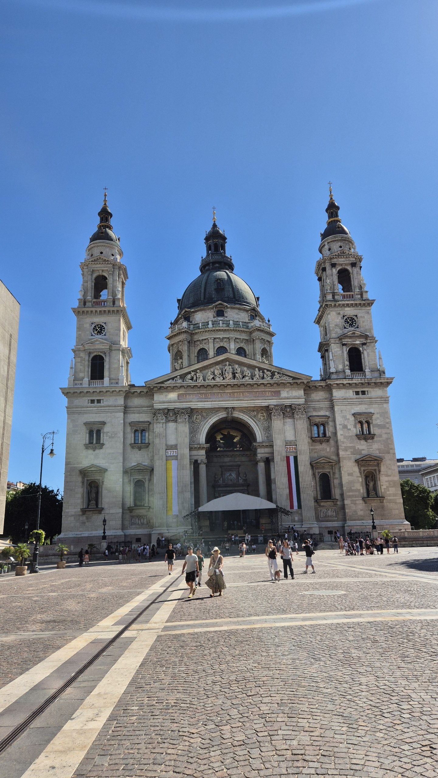 St Stephen's Basilica beneath a clear blue sky in Budapest