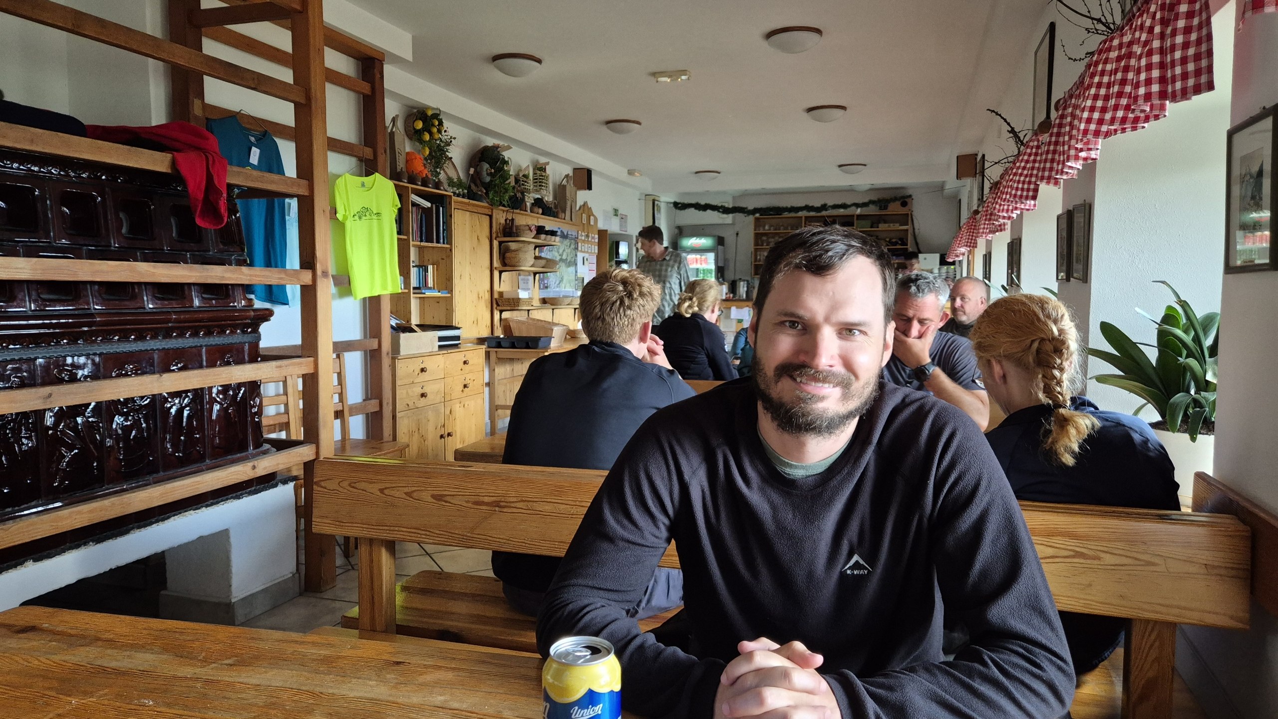 Hugo sharing a Radler in the Dom na Komni dining room