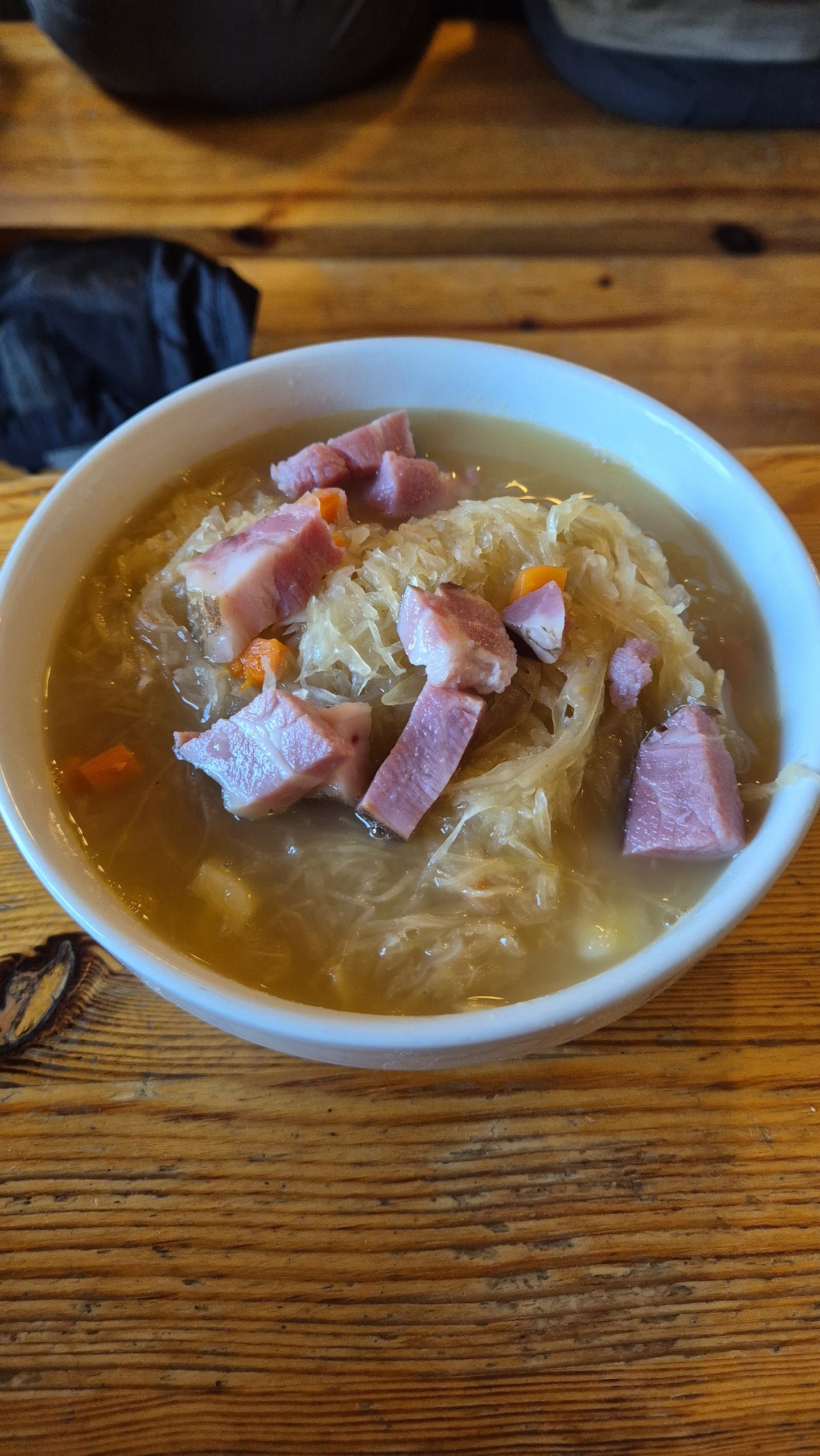 A large serving of sauerkraut with beans and meat