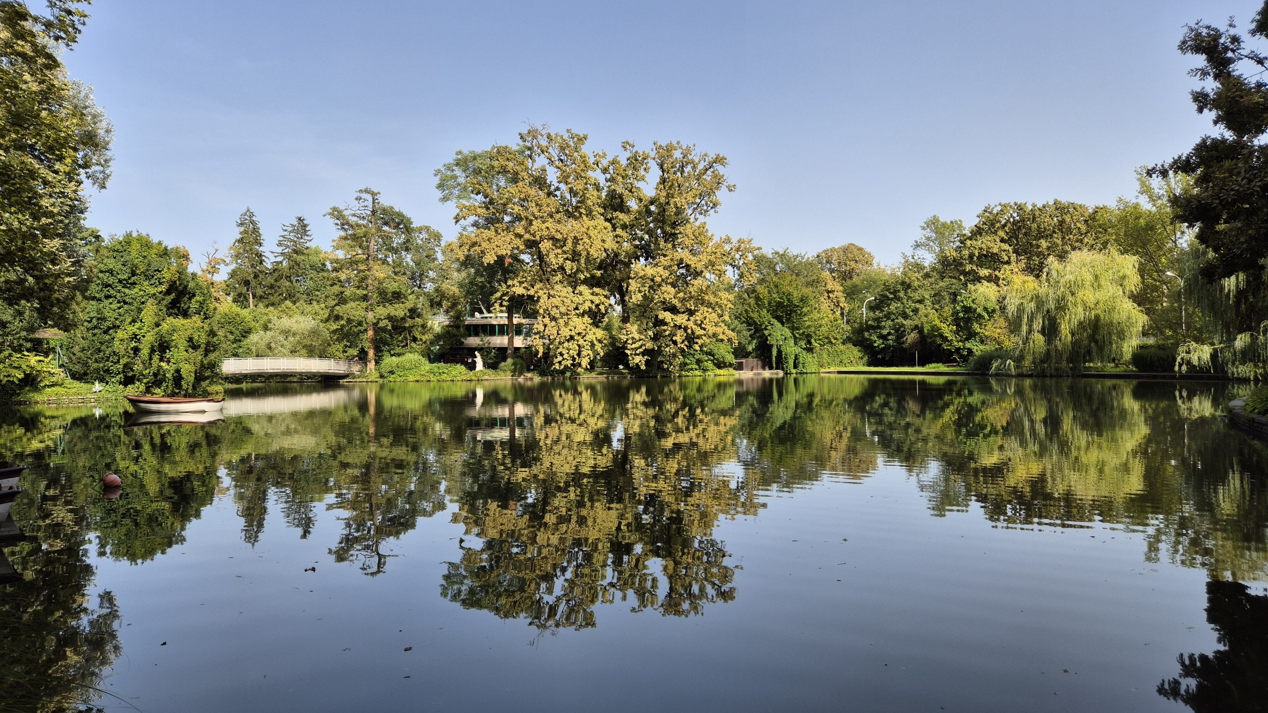Trees reflected in a calm lake in Maksimir Park Zagreb