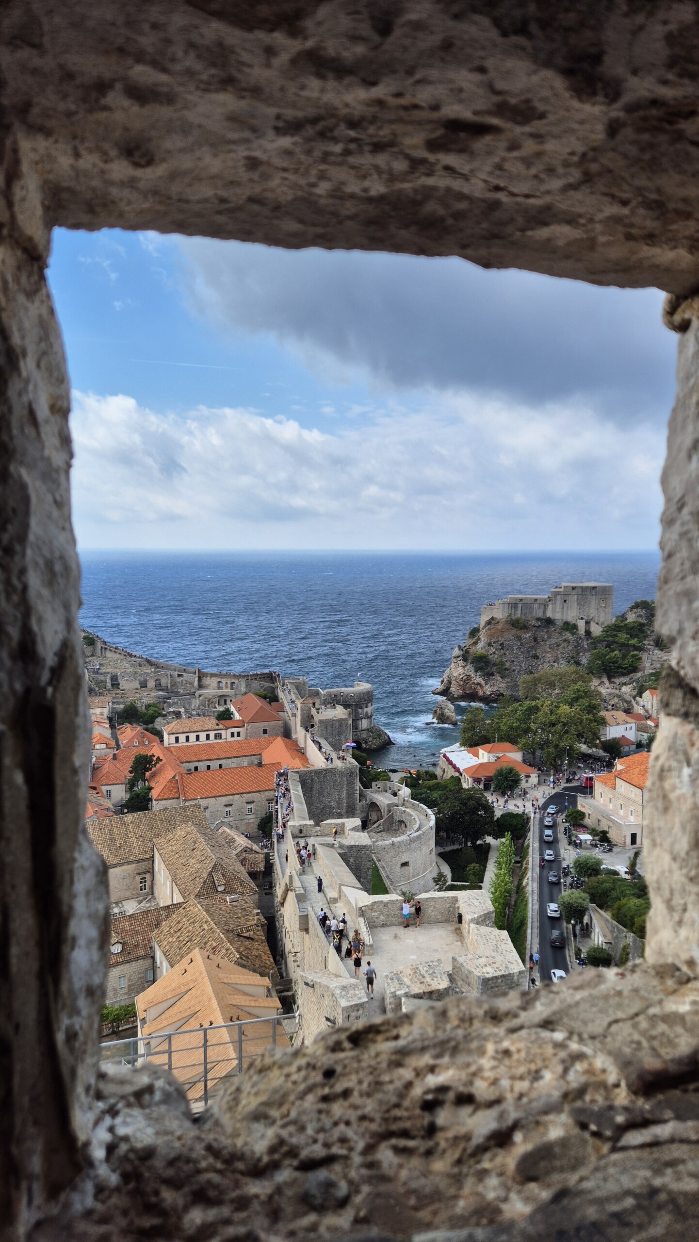 20260911_111658 Dubrovnik framed through a stone opening in the walls