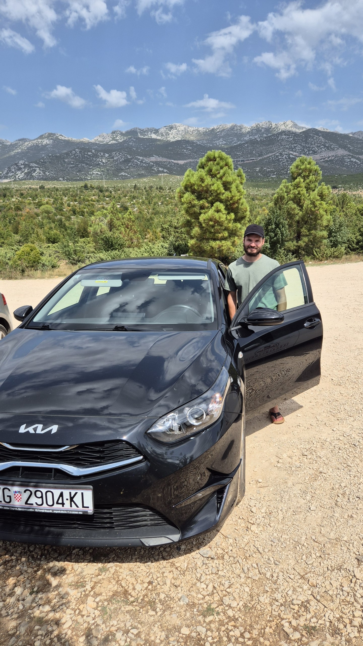 Hugo beside the rental car near the Zrmanja canyon viewpoint
