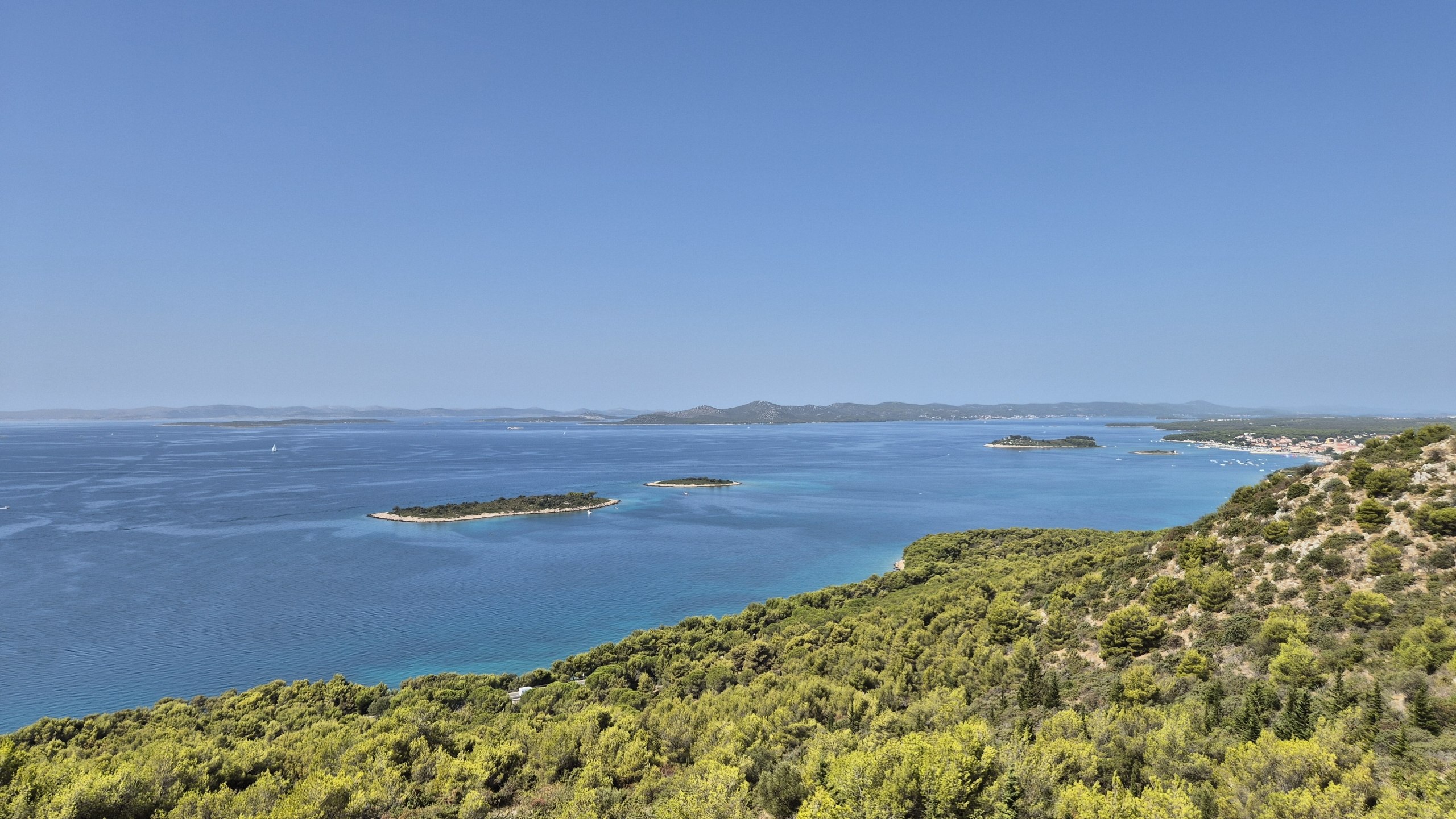 Wide view across the blue Adriatic and its islands from a coastal viewpoint