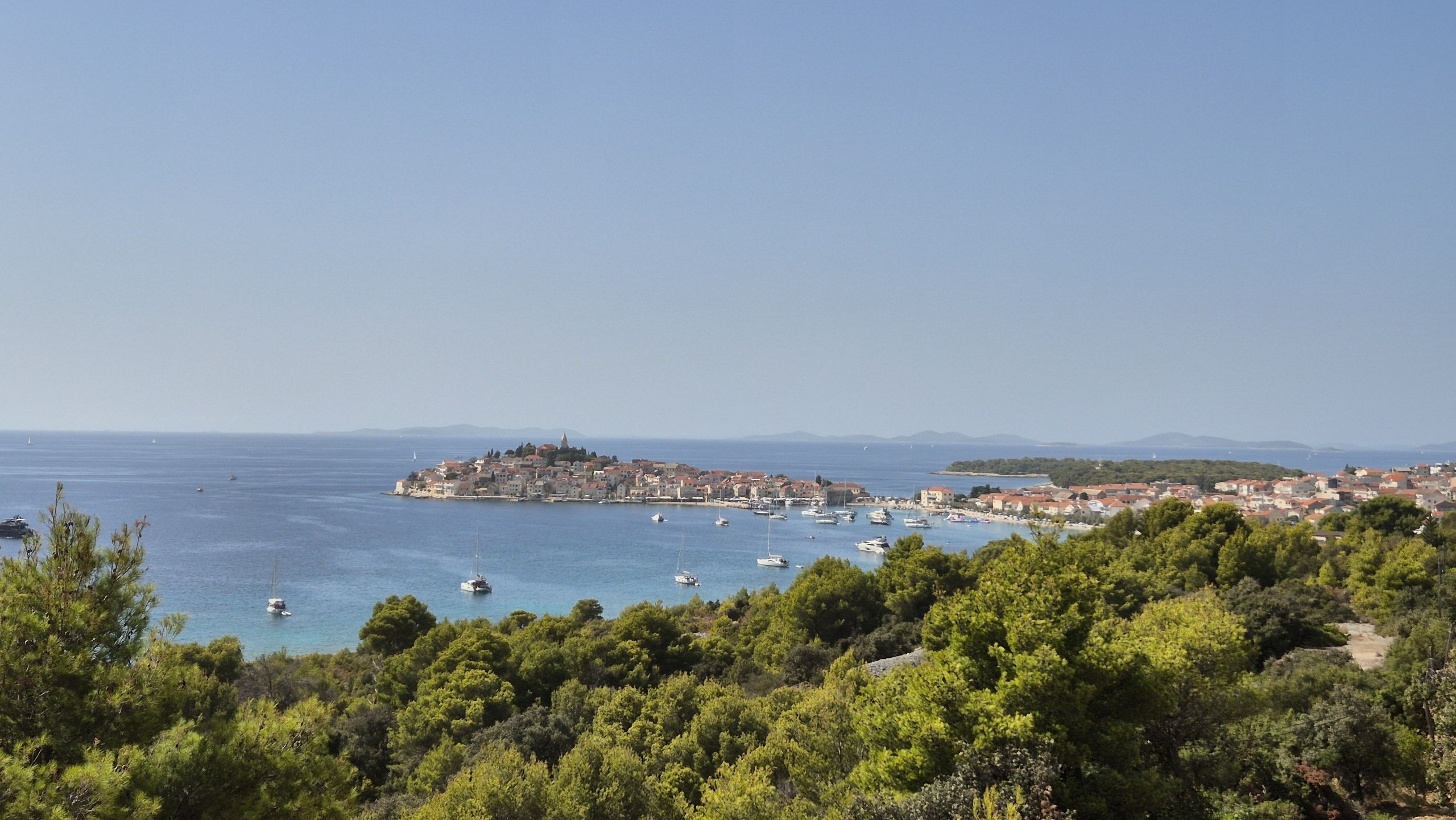 View over Primošten and the surrounding blue water from the coast road