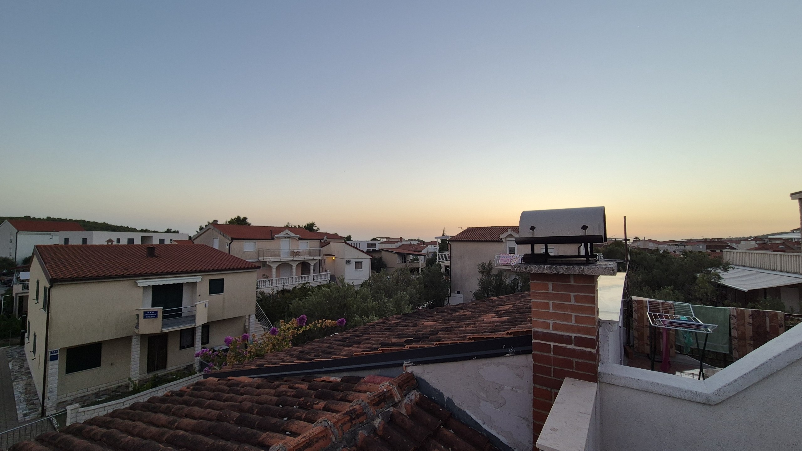 Evening view across the rooftops from the accommodation in Rogoznica