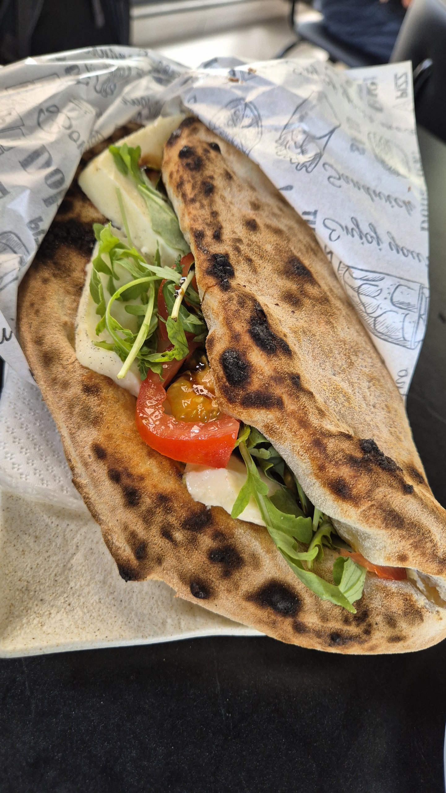 Focaccia generously filled with mozzarella, pesto, tomato and rocket