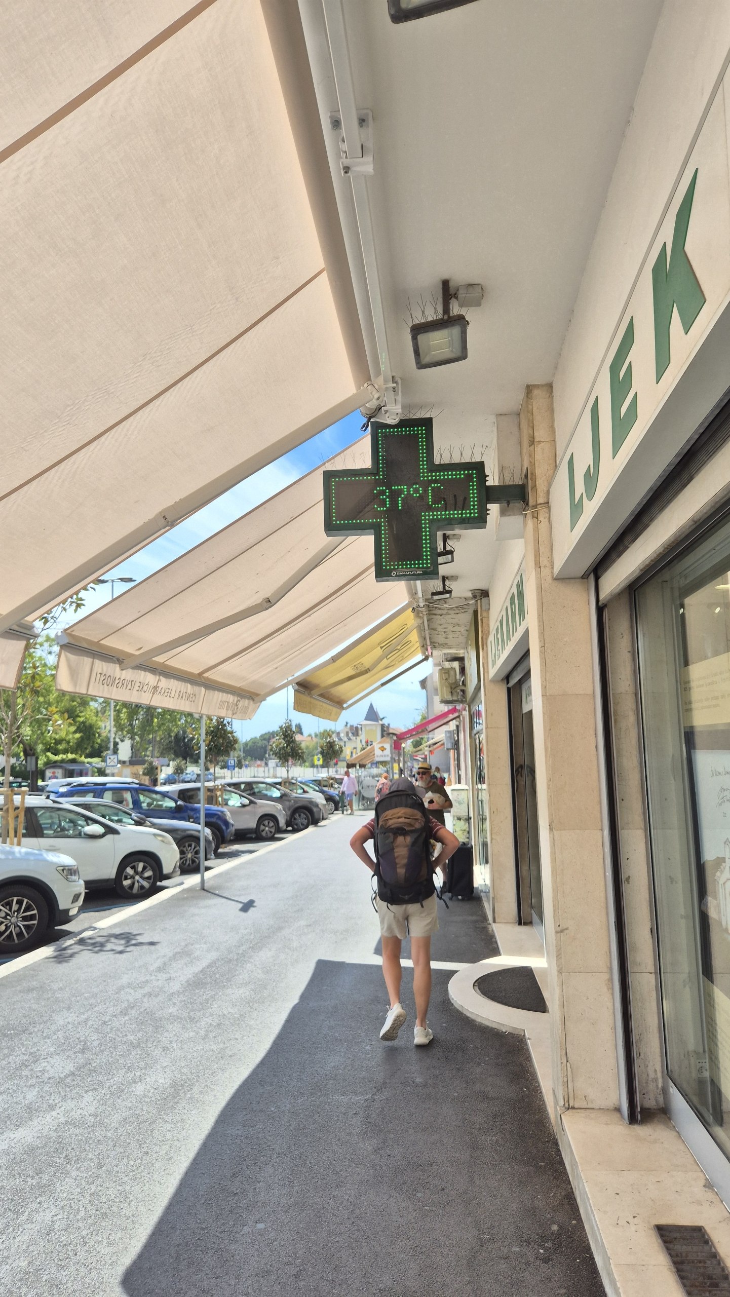 A pharmacy sign in Split displaying 37 degrees Celsius