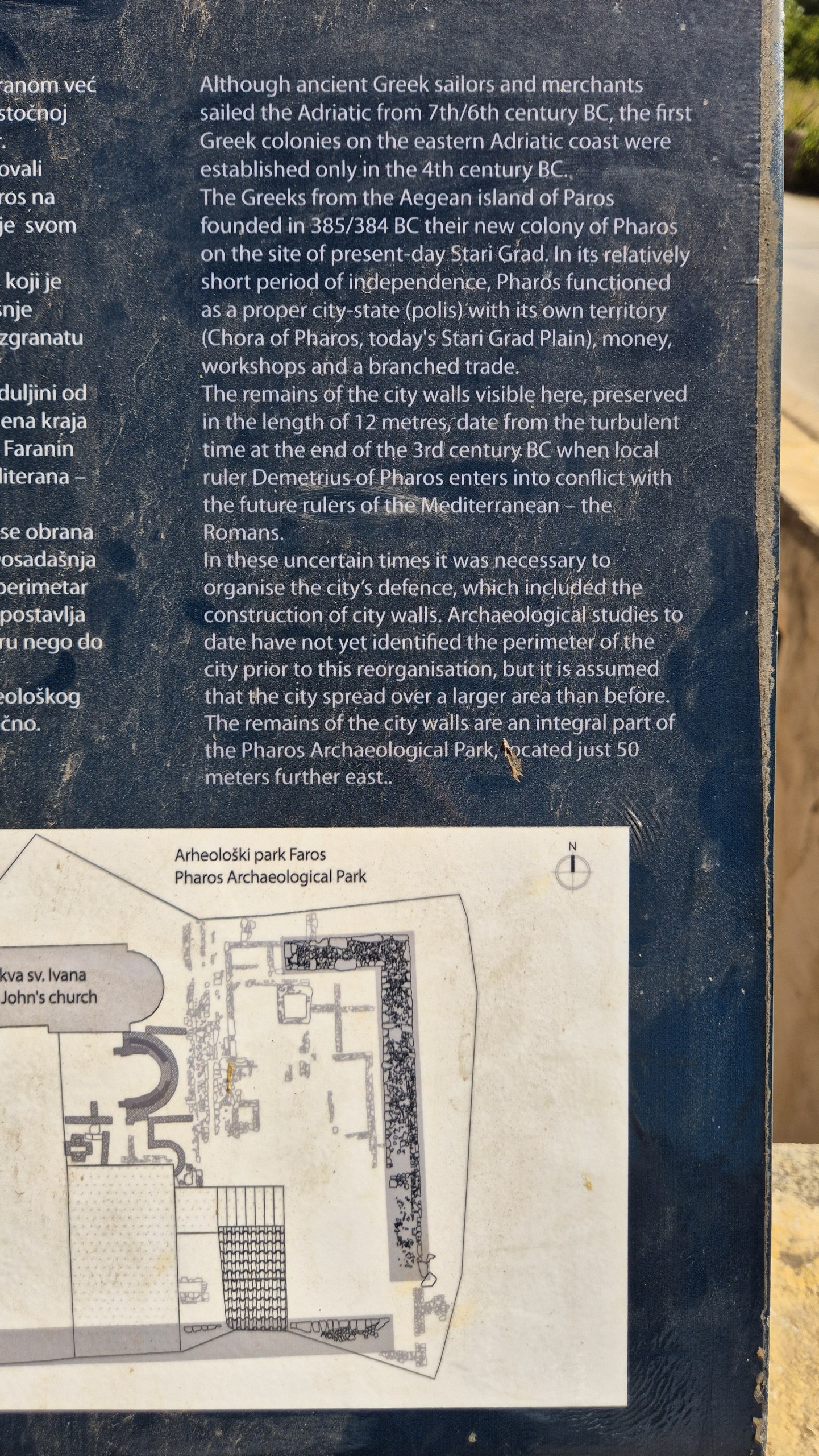 Information sign explaining the ancient Greek city walls of Pharos