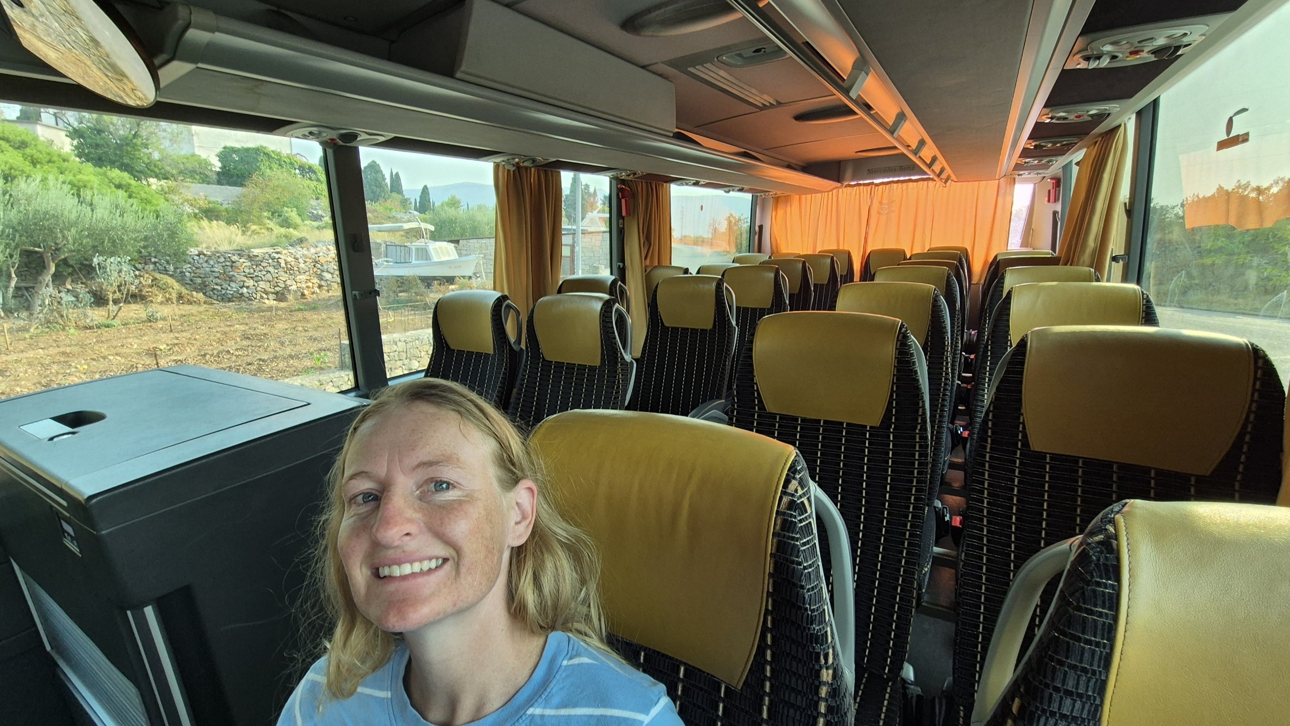 Caro sitting in an otherwise empty bus from Vrboska to Jelsa