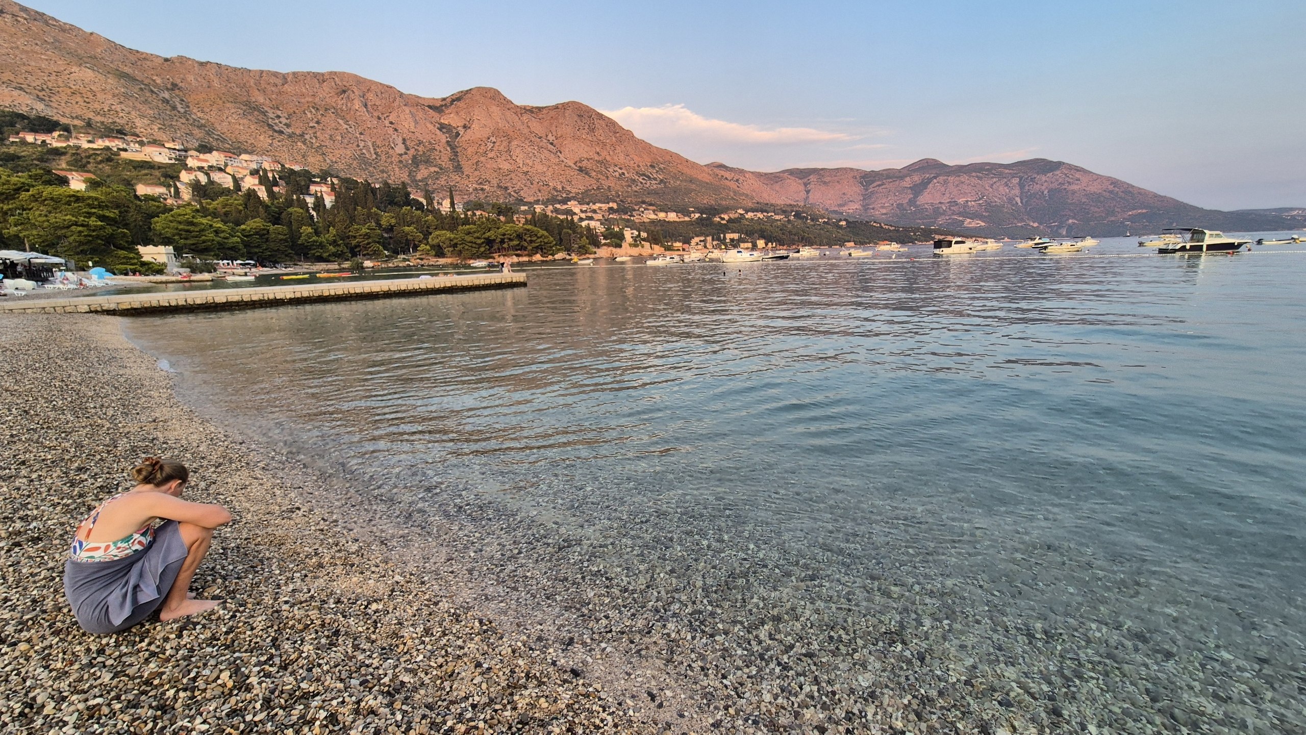 Caro at the pebble beach in Mlini in the evening light