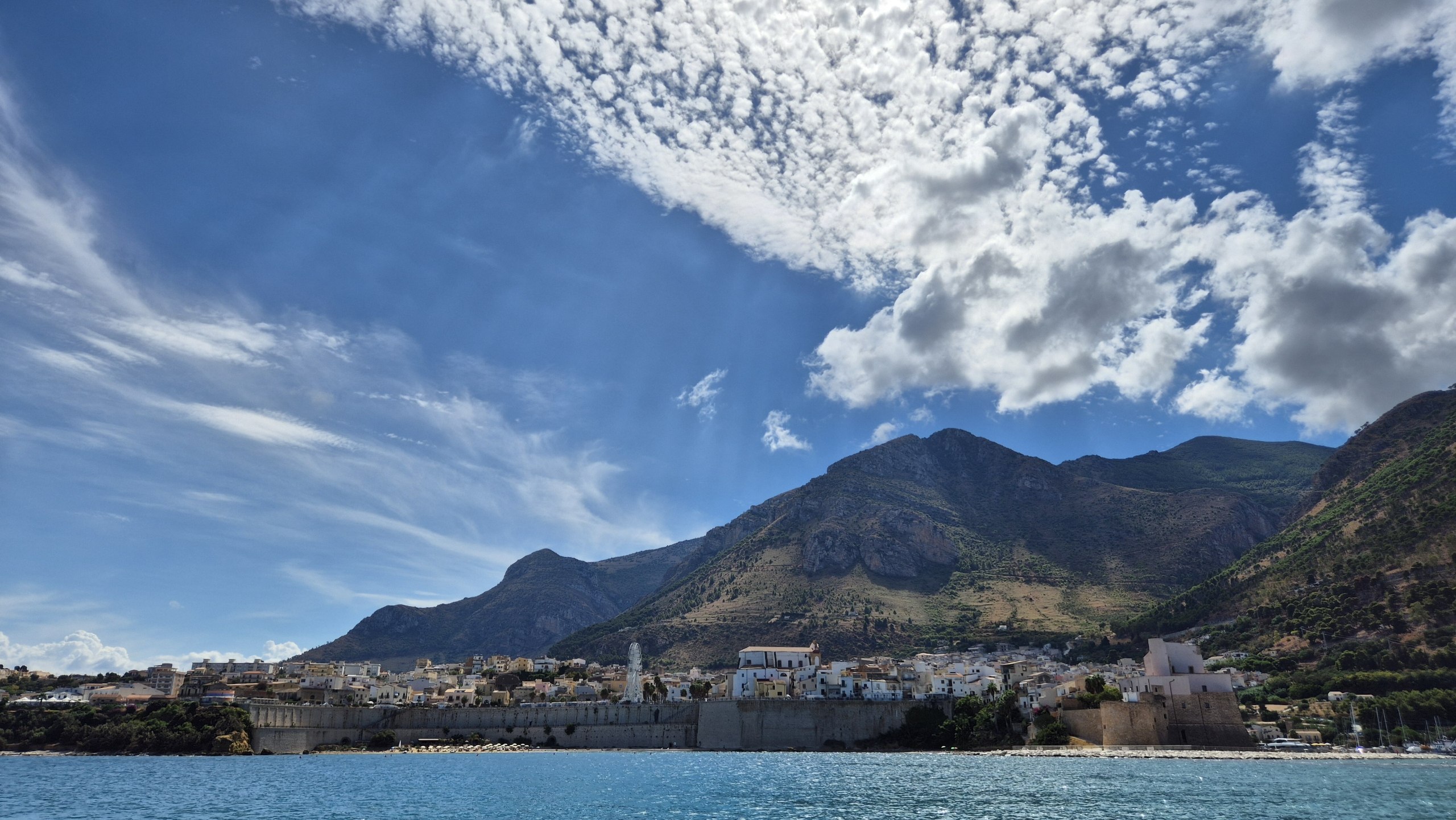 day49-castellammare-from-sea Castellammare del Golfo beneath its mountains and piled-up clouds