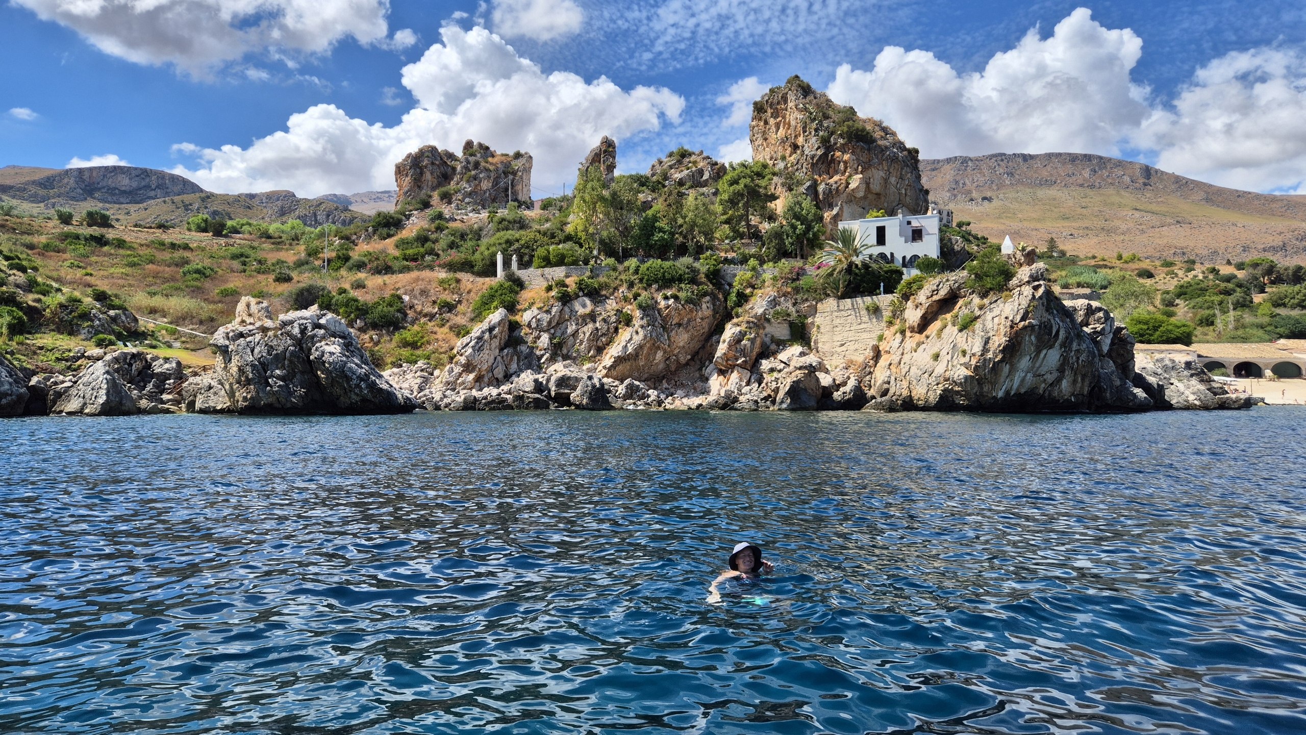 day49-swim-near-scopello Swimming off the rocky shore near Scopello