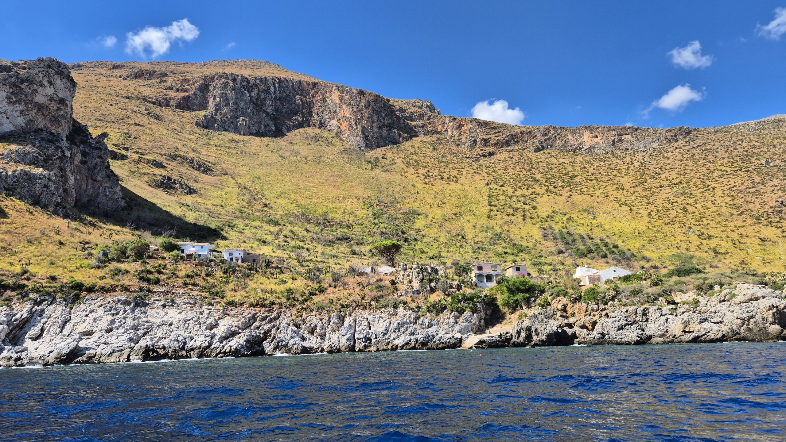 day49-zingaro-coast Steep slopes of the Zingaro Nature Reserve dropping to the sea