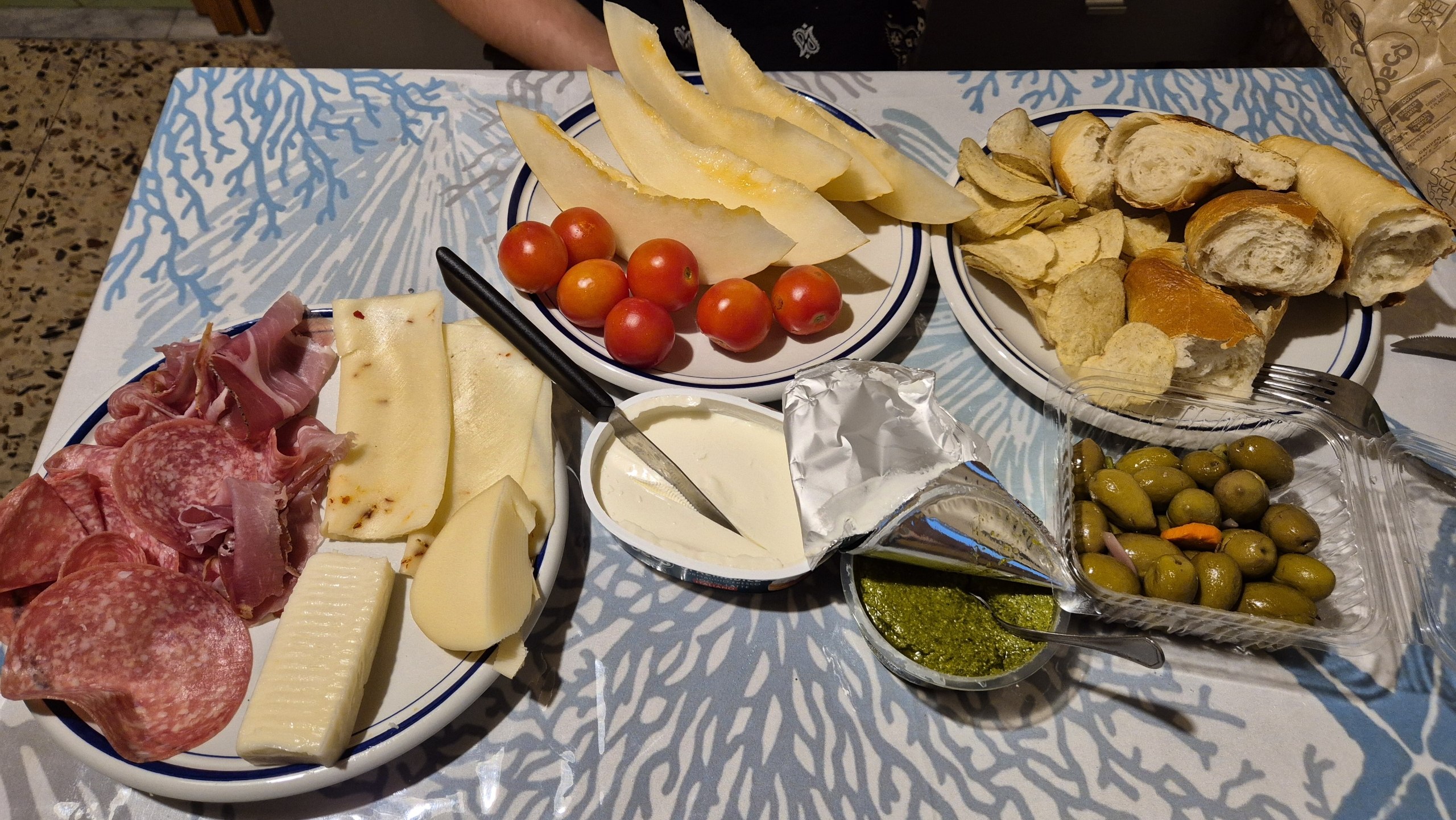 day52-platter-feast A platter of salami, prosciutto, cheese, tomatoes, olives, pesto and bread