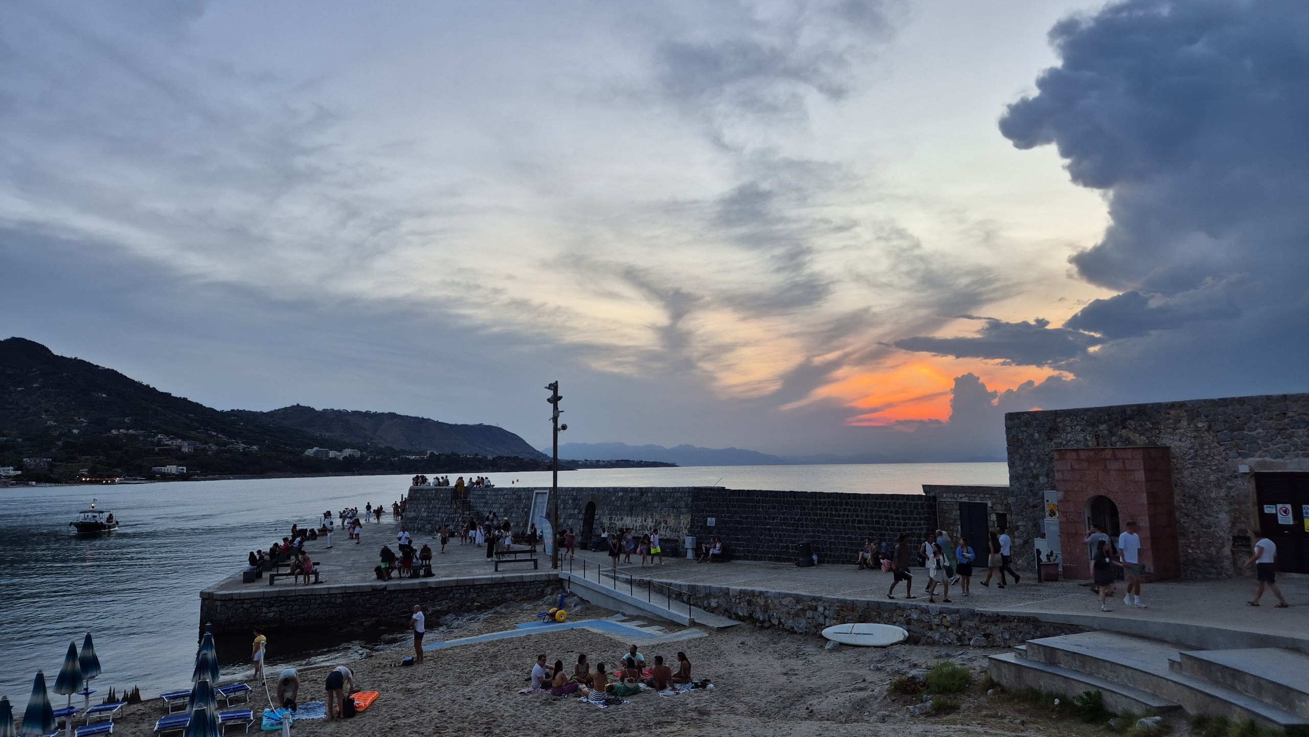 days53-54-cefalu-harbour-sunset Sunset over Cefalù harbour and the old stone pier
