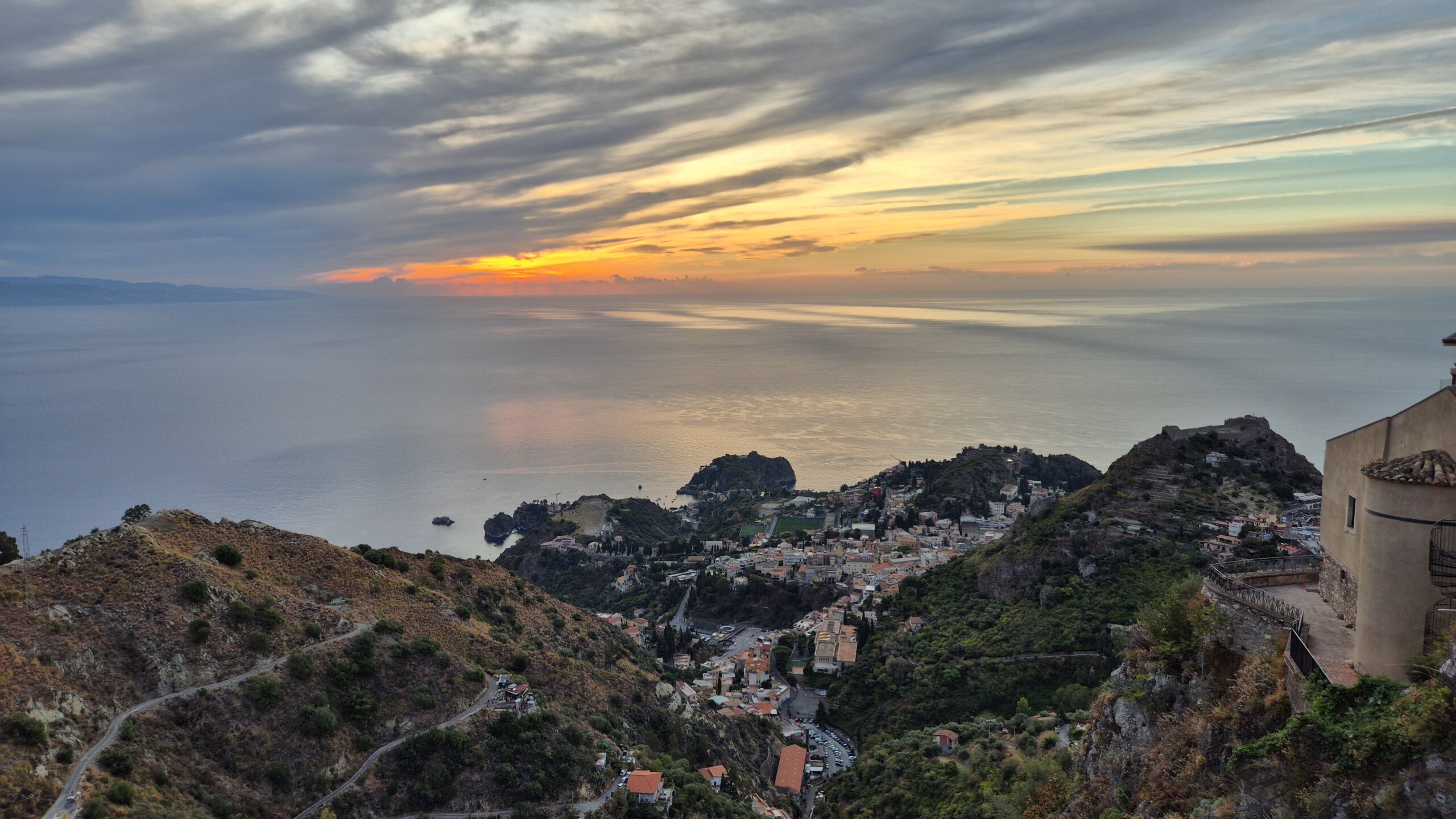 day60-castelmola-dawn Dawn over the sea and the coast below Castelmola on the morning of departure