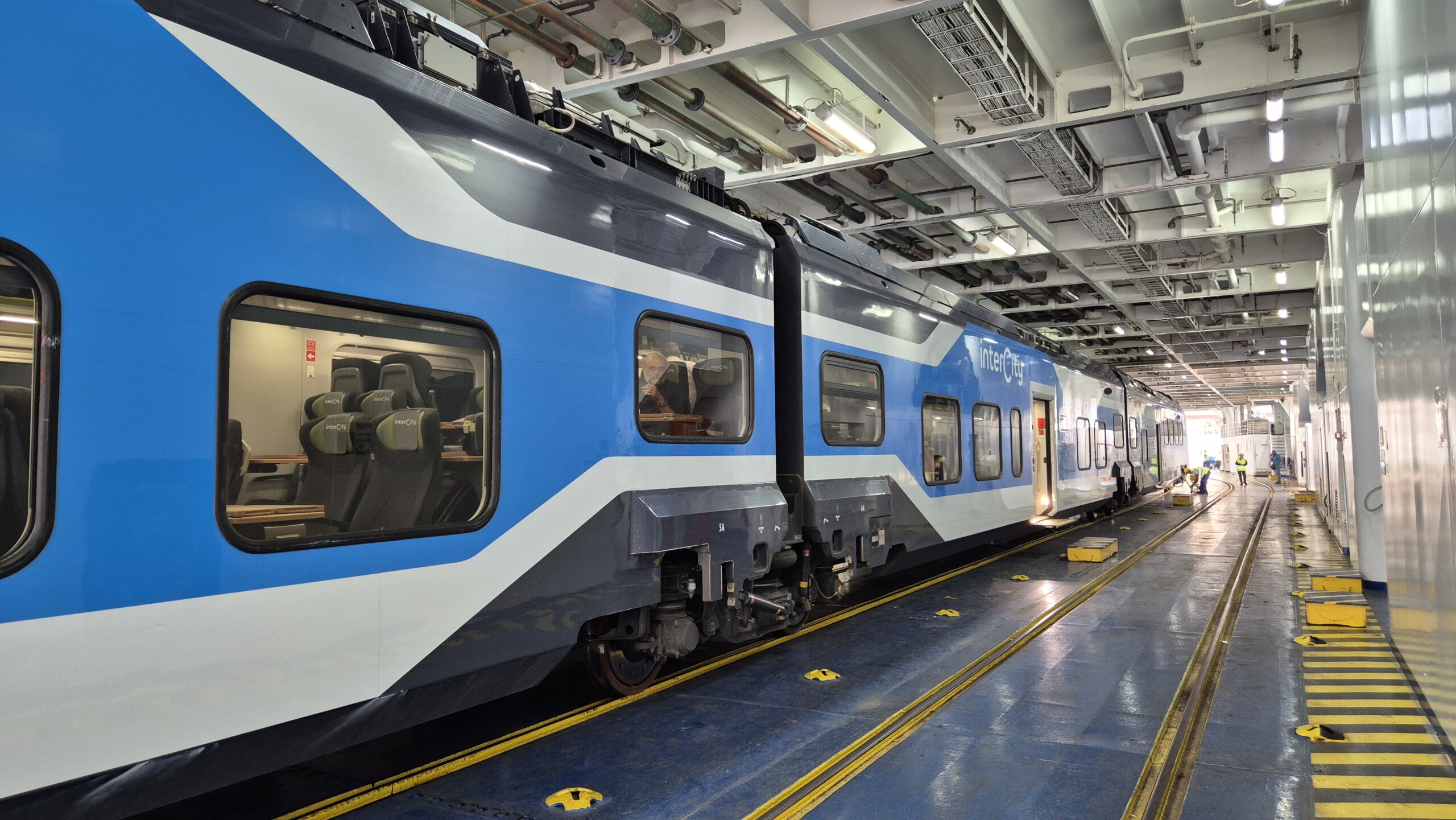 day60-intercity-on-ferry-deck The Intercity train standing on the rail deck inside the Strait of Messina ferry