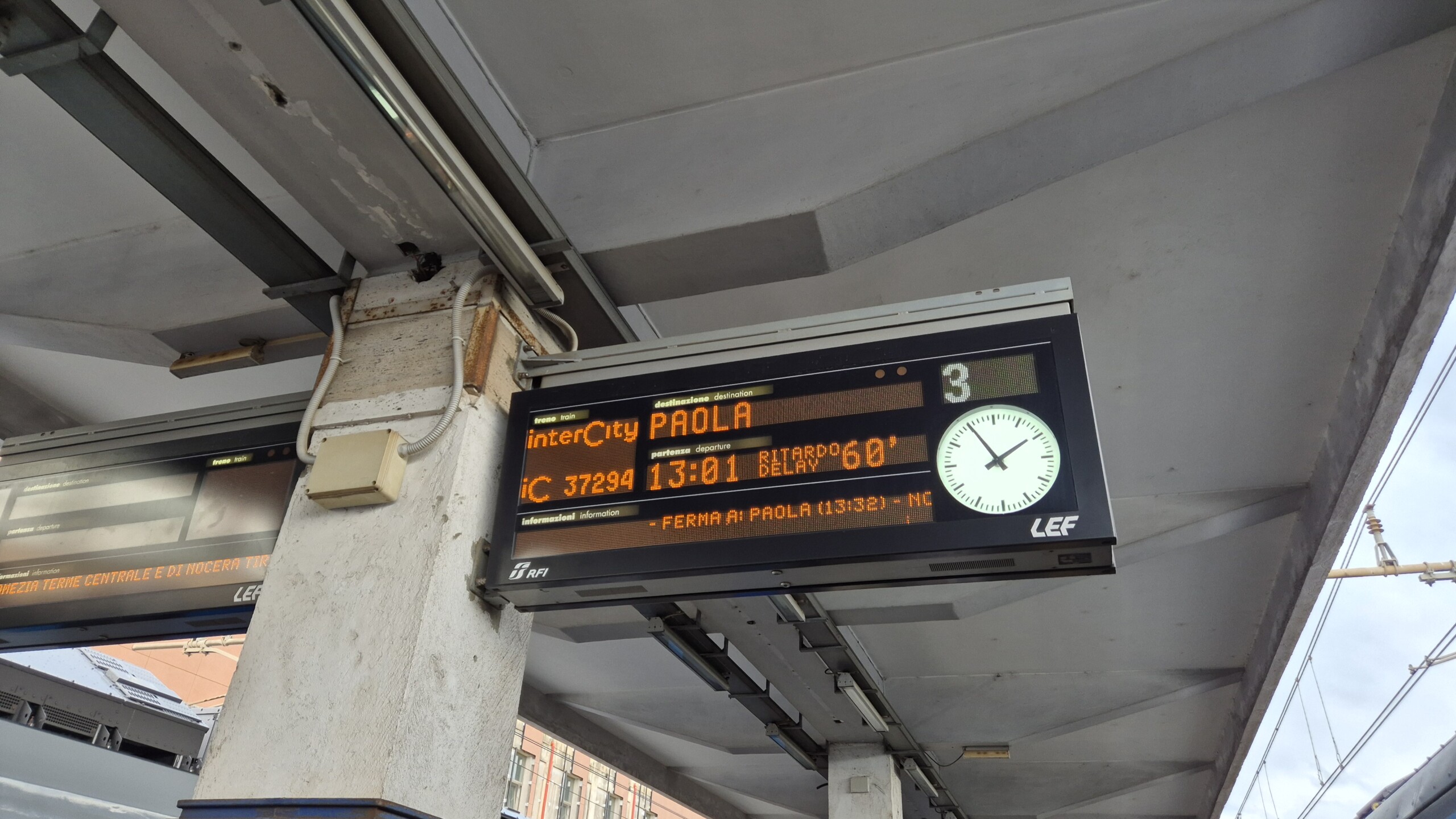 day60-lamezia-paola-board Platform board at Lamezia Terme showing the Intercity to Paola running 60 minutes late