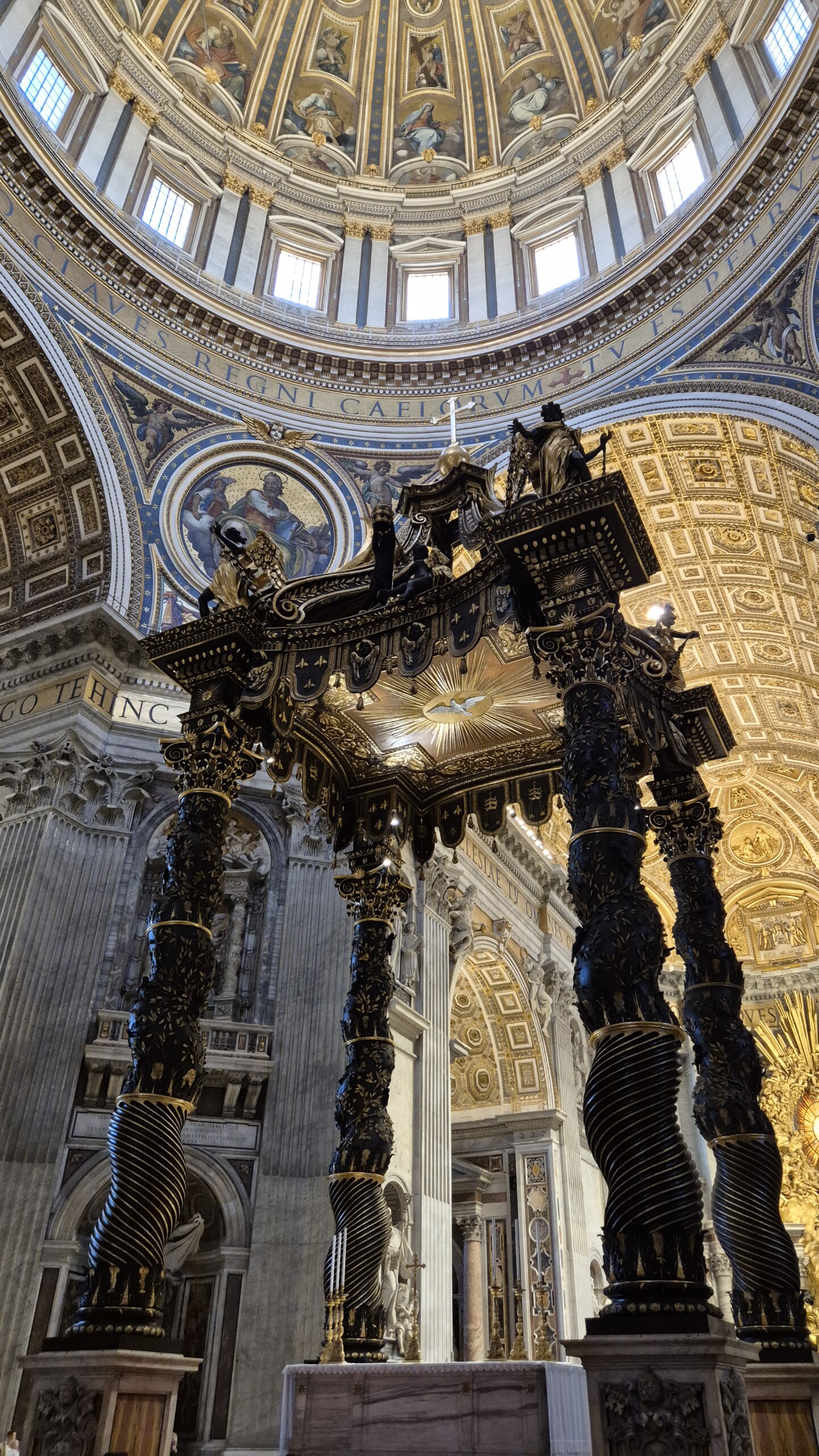 day64-bernini-baldacchino Bernini's bronze baldacchino and its twisted columns beneath the dome of St Peter's