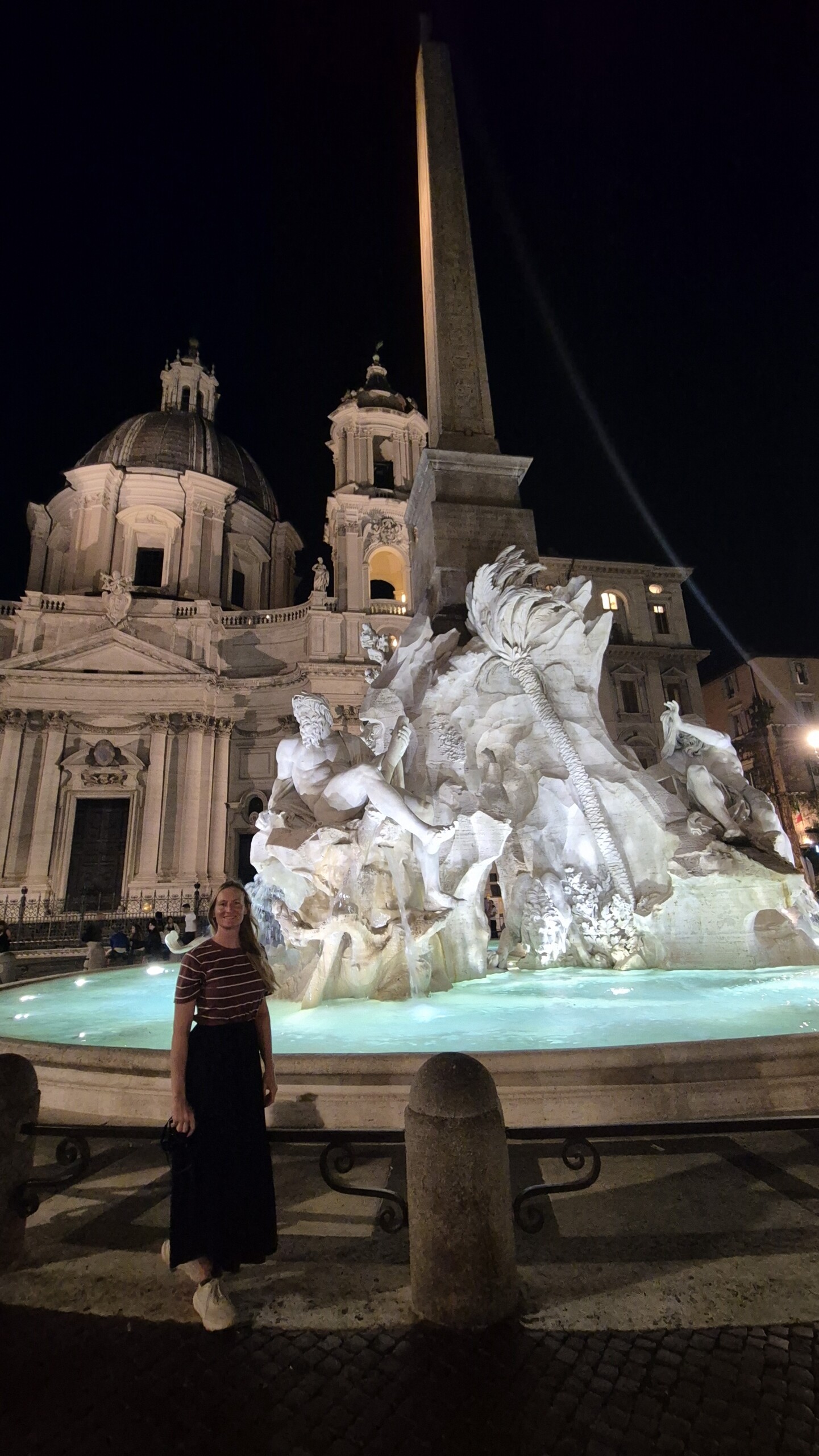 day64-piazza-navona-night Caro beside Bernini's Fountain of the Four Rivers in Piazza Navona at night