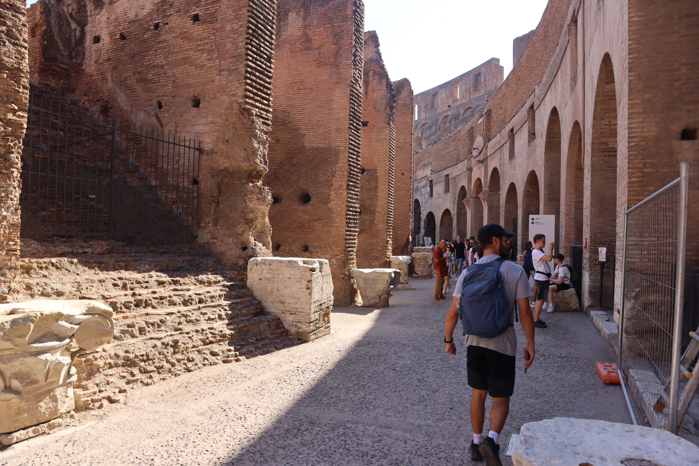 day65-colosseum-brick-passage Visitors walking through an ancient brick passage inside the Colosseum