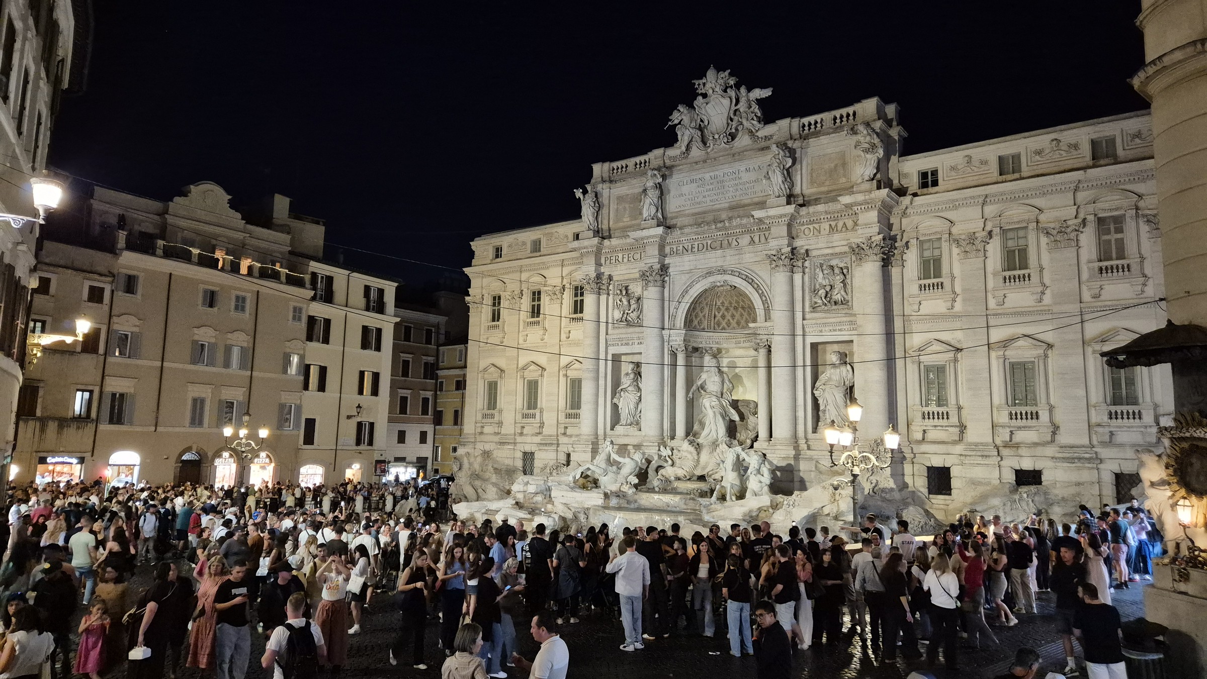 day65-trevi-fountain-crowd The Trevi Fountain at night behind a dense crowd of visitors