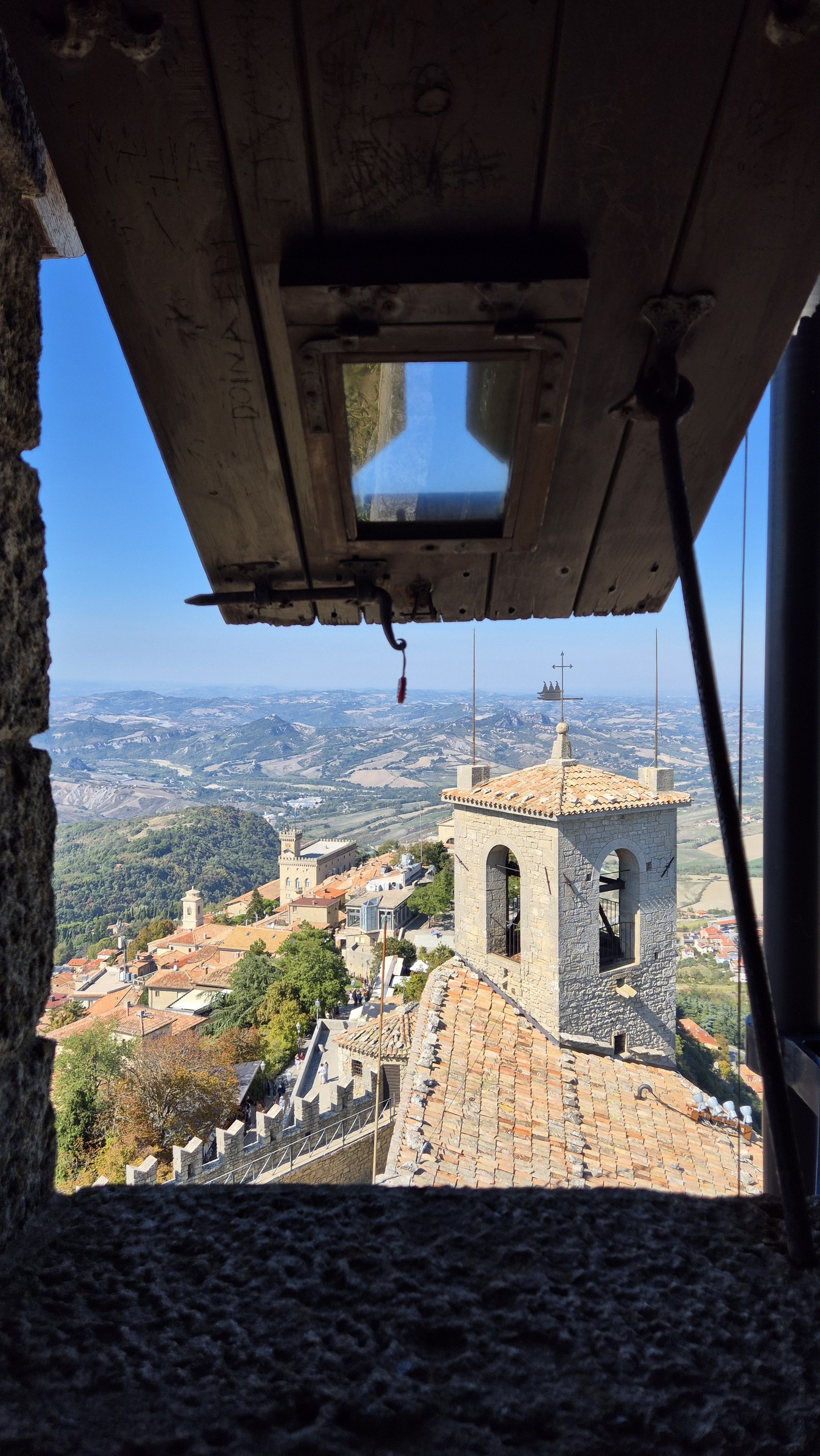 day69-guaita-window-view The view across San Marino through an opening in the First Tower Guaita